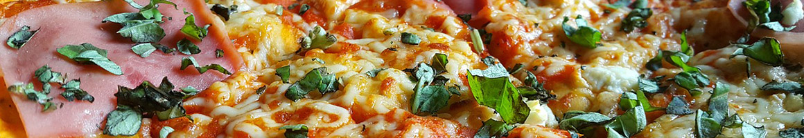 Eating Italian Pizza at Pie-zan's Home of Frankie Meatballs restaurant in Fort Lauderdale, FL.